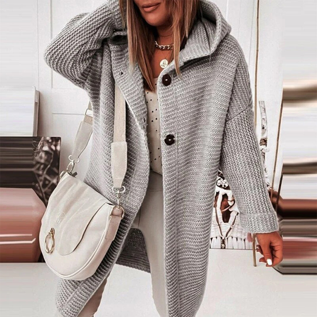 Cozy pink women's hooded button-front cardigan, mid-length style for fall layering & everyday comfort.