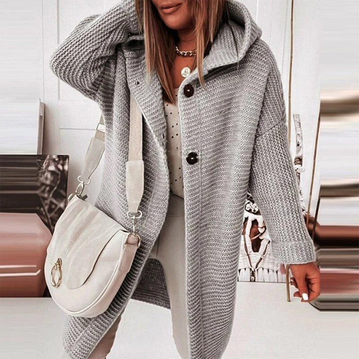 Cozy pink women's hooded button-front cardigan, mid-length style for fall layering & everyday comfort.