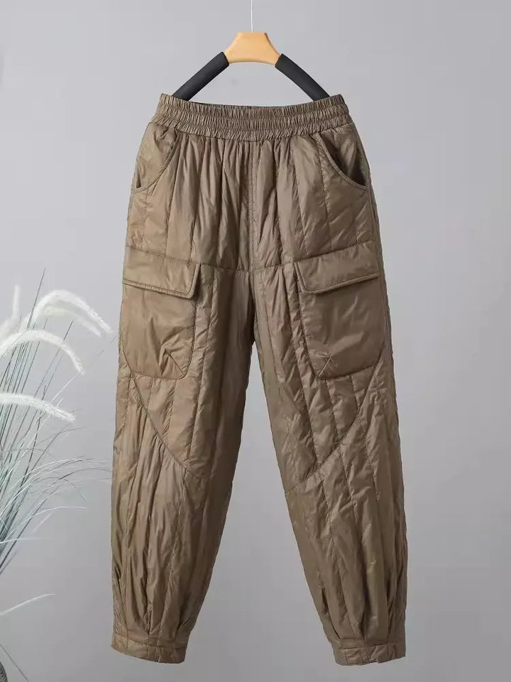 Soft women's quilted comfort pants. Features an elastic waist & pockets, great for lounging & casual wear.
