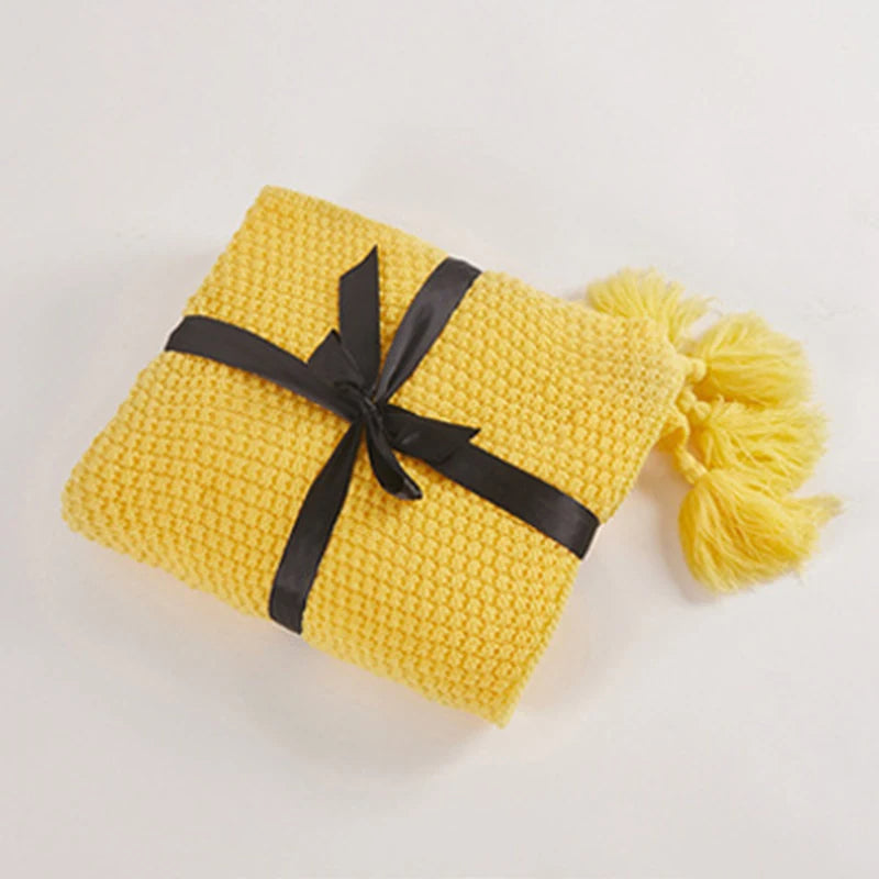 Soft Scandinavian wool throw blanket with a chunky knit, perfect for adding warmth.