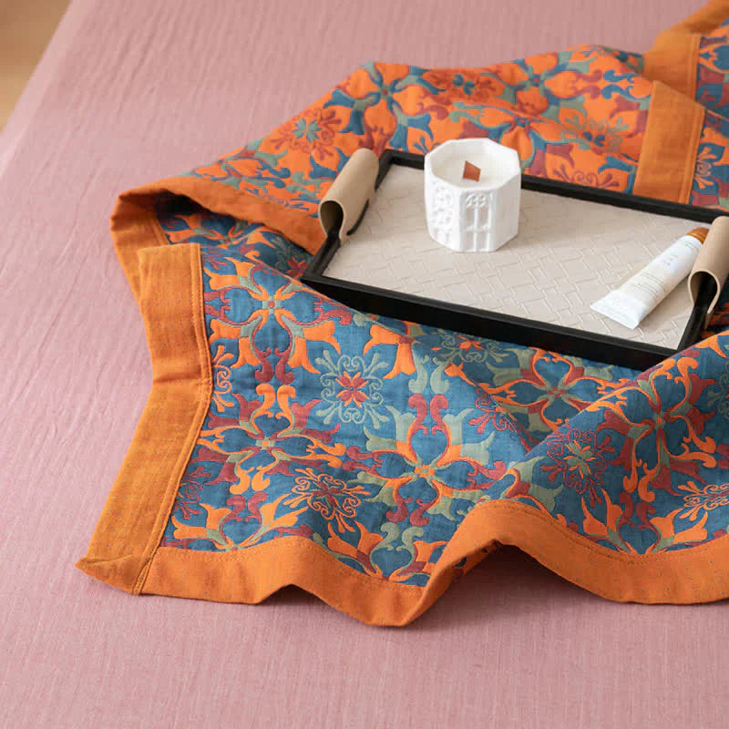 Decorative six-layer cotton quilt in bright orange and blue, a perfect bedroom accent