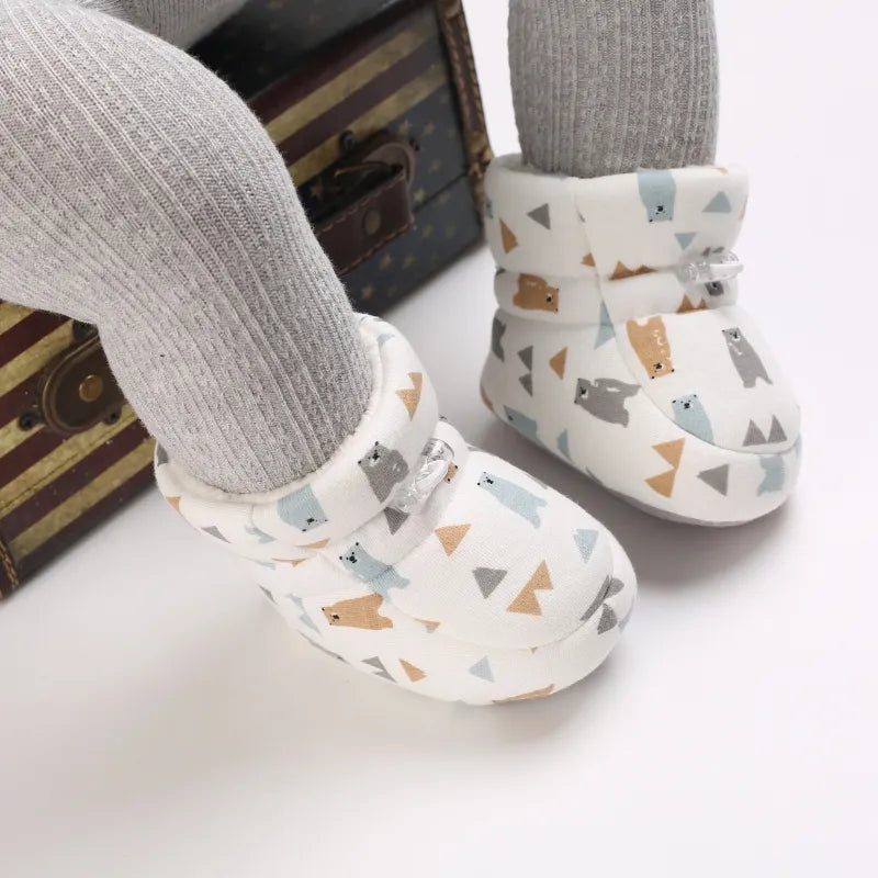 Cozy SnugToes baby winter boots for newborns, anti-slip sole for safe first steps in snow, warm infant footwear.