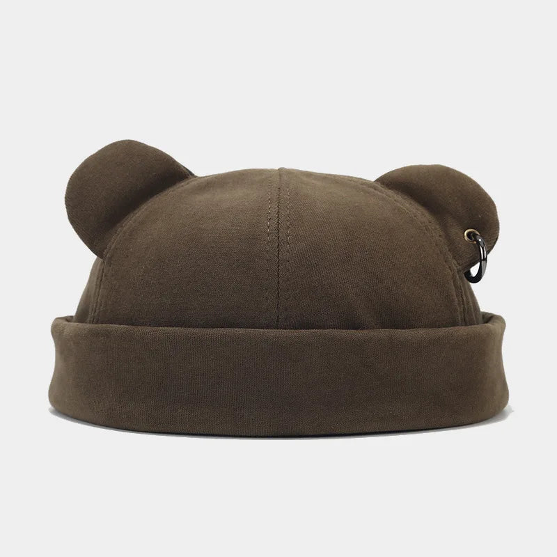 Playful unisex winter hat featuring cozy bear ears. This soft knit beanie is a fun accessory for all ages.