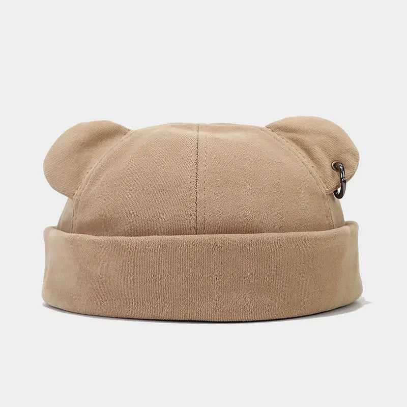 Charming bear ears beanie, a cozy soft knit hat for unisex winter wear. Adds playful style to any outfit.