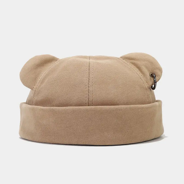 Charming bear ears beanie, a cozy soft knit hat for unisex winter wear. Adds playful style to any outfit.