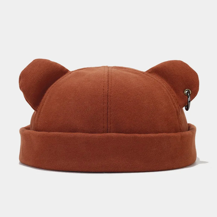 Fashionable unisex bear ears beanie. This soft knit cozy hat is a playful and warm accessory for winter style.