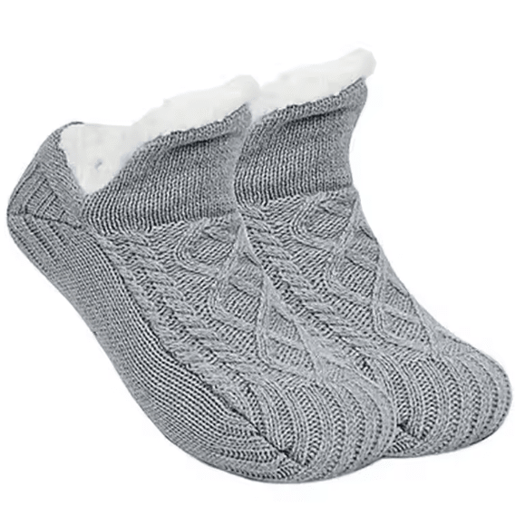 Plush indoor socks, perfect for warmth and cozy comfort during sleep or relaxation.