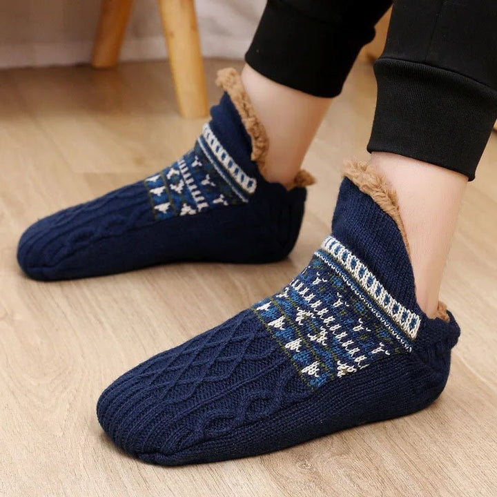 Plush house socks for men & women, offering cozy warmth & foot comfort for lounging or sleep.
