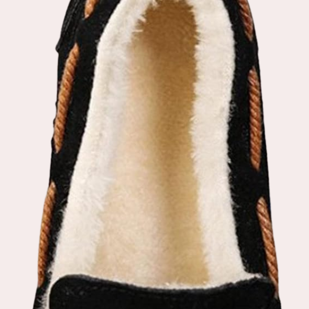 Elegant Selina women's house slippers. Classic design, warm & non-slip for cozy indoor comfort.