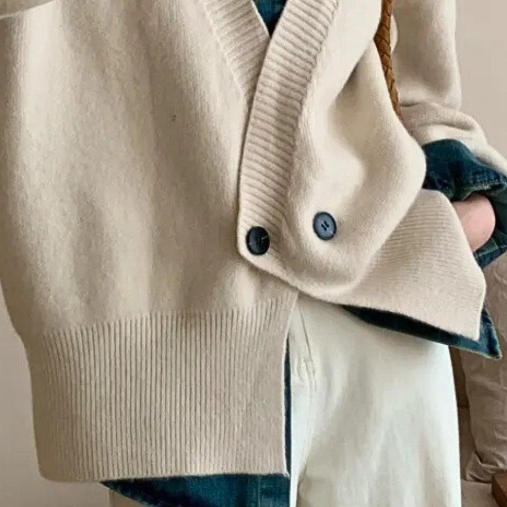 Warm & versatile women's beige knitted cardigan. A must-have layering piece for comfortable, chic fashion.