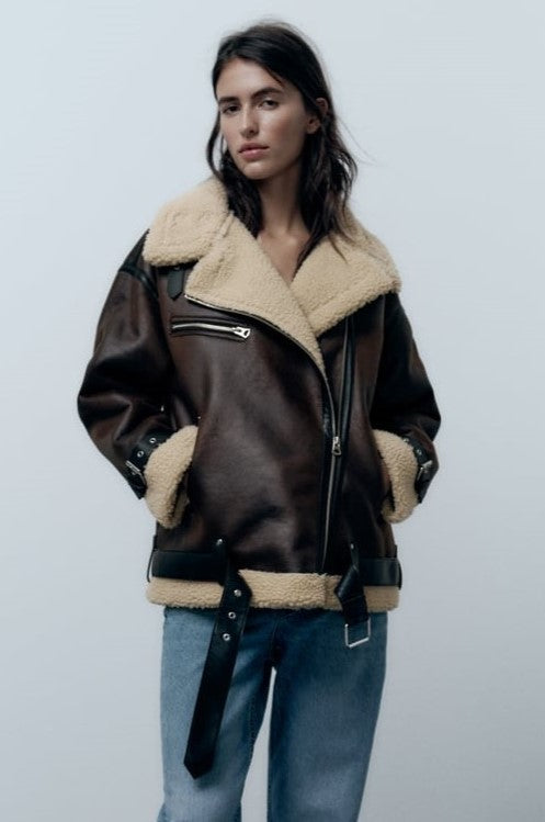 Cozy women's brown lapel jacket, perfect for autumn and winter style. Chic and versatile outerwear.