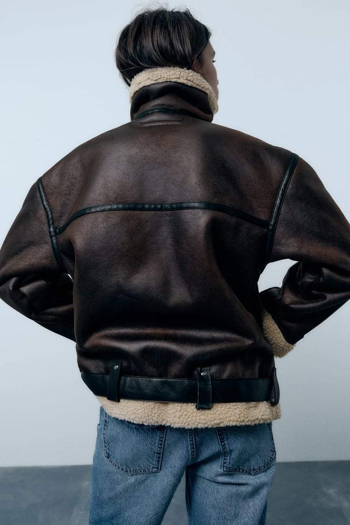 Warm & stylish women's brown lapel jacket. Cozy outerwear for winter style and autumn fashion.