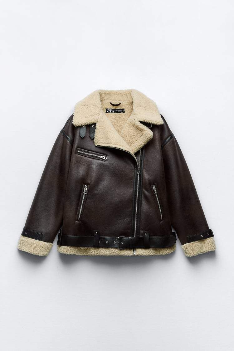Modern women's brown lapel jacket. Cozy and chic, perfect for everyday autumn fashion and stylish winter layers.