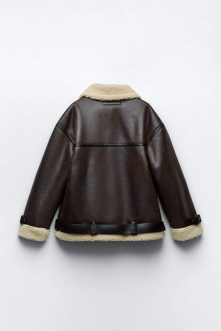 Fashionable women's brown lapel jacket. Cozy outerwear for autumn and winter style. Chic and versatile coat.