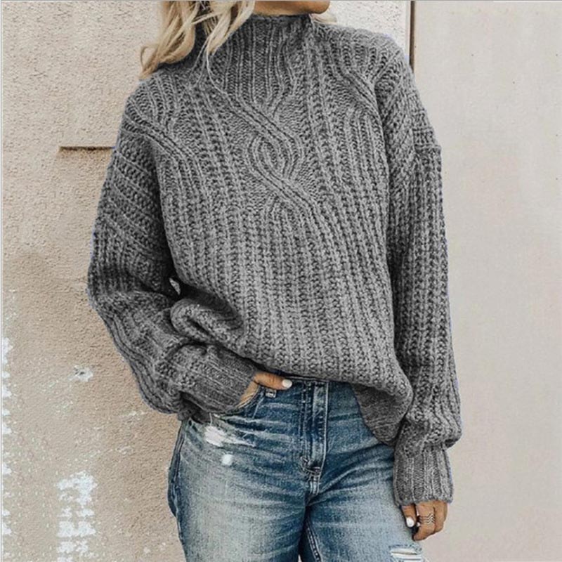 Chic women's cable knit roll neck sweater. Ideal for autumn and winter, offering cozy style and warmth.