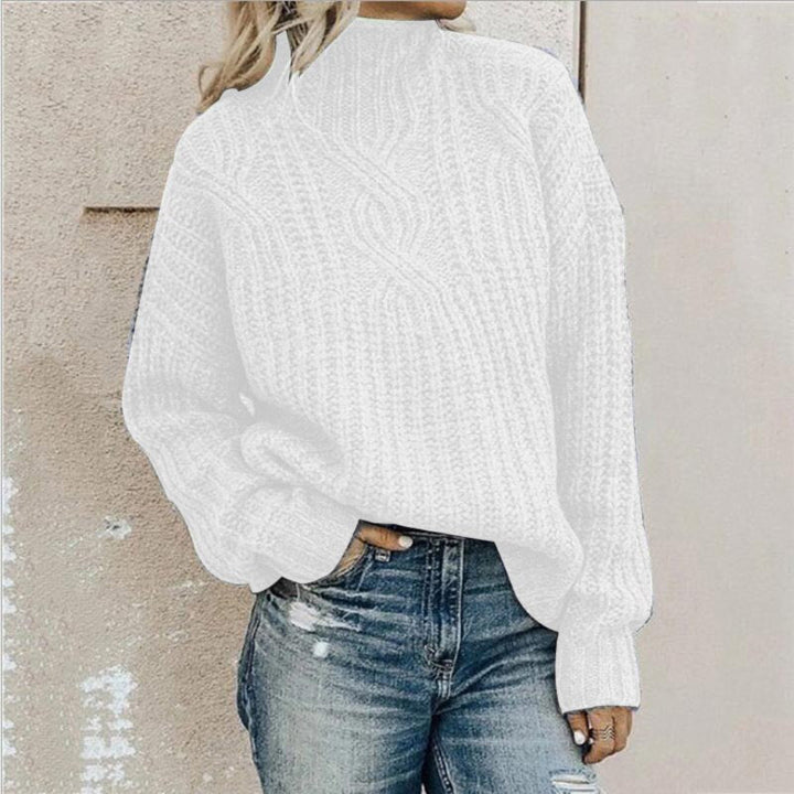 Women's cozy cable knit roll neck sweater. Warm and comfortable knit pullover, essential for winter fashion.