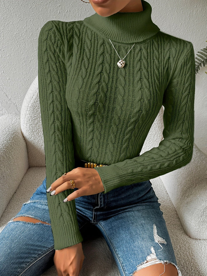 Classic women's cable knit turtleneck sweater. A cozy long sleeve top, perfect winter knitwear for any occasion.