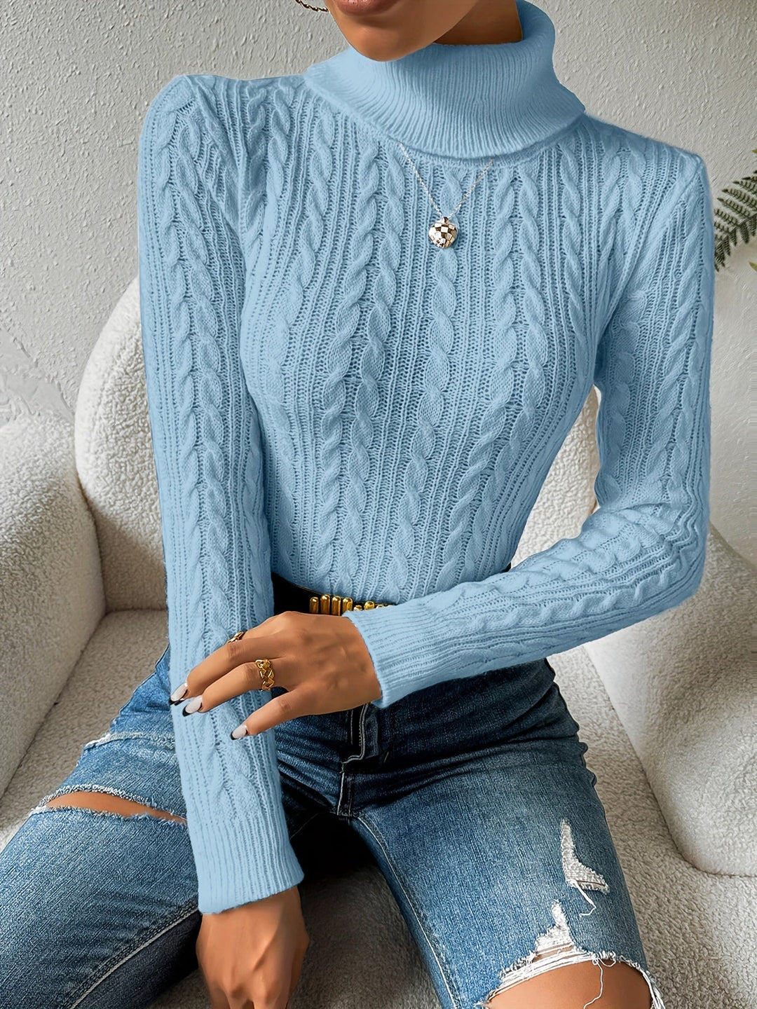 Textured cable knit turtleneck sweater for women. Cozy long sleeve design, a stylish and elegant winter top.