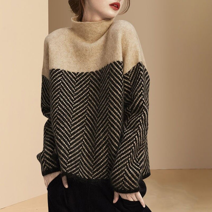Fashionable women's color block knit pullover sweater. Chic, cozy, loose-fit top for everyday casual wear.