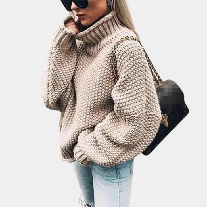 Cozy women's high-neck sweater in warm knit, perfect for winter fashion & comfortable everyday wear.