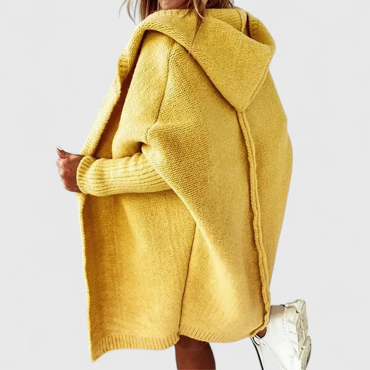 Women's comfortable hooded long sleeve cardigan, knee-length, oversized knit for versatile layering.