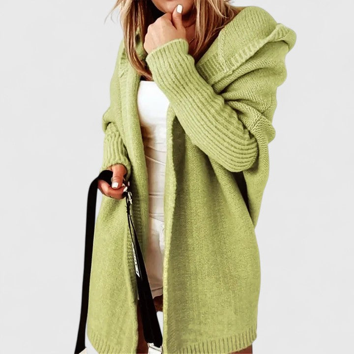 Versatile women's hooded long sleeve cardigan, oversized knee-length knit, perfect outerwear for layering.