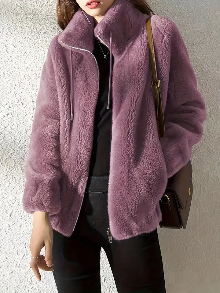 Trendy multi-color women's hooded zip-up jacket with drawstring, great for fall and winter fashion.