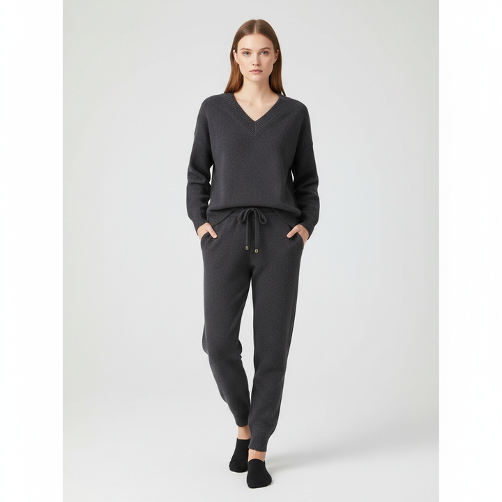 Warm winter fashion: women's cozy knit two-piece set with V-neck top and wide-leg pants.