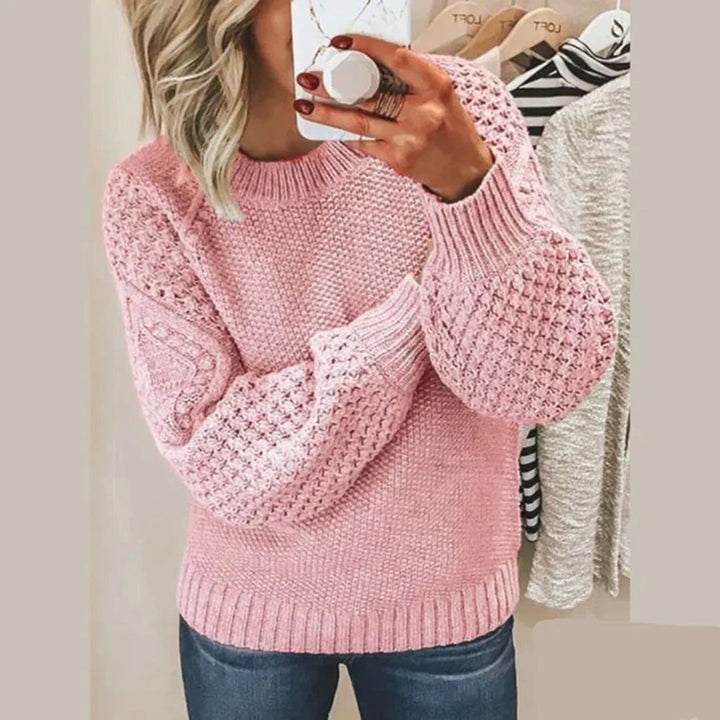 Warm knitted top for women, ideal for fall fashion & winter. Experience stylish comfort in this knitwear.