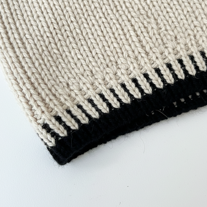 Close-up of the soft knitted texture of the women's two-piece lounge set, emphasizing comfort