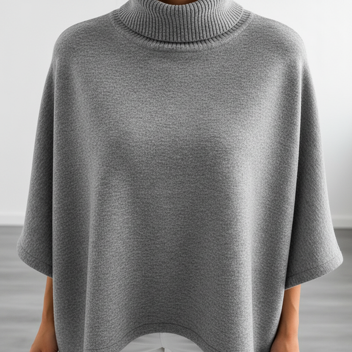 Soft knit sweater for women, featuring a high roll-neck and relaxed oversized fit