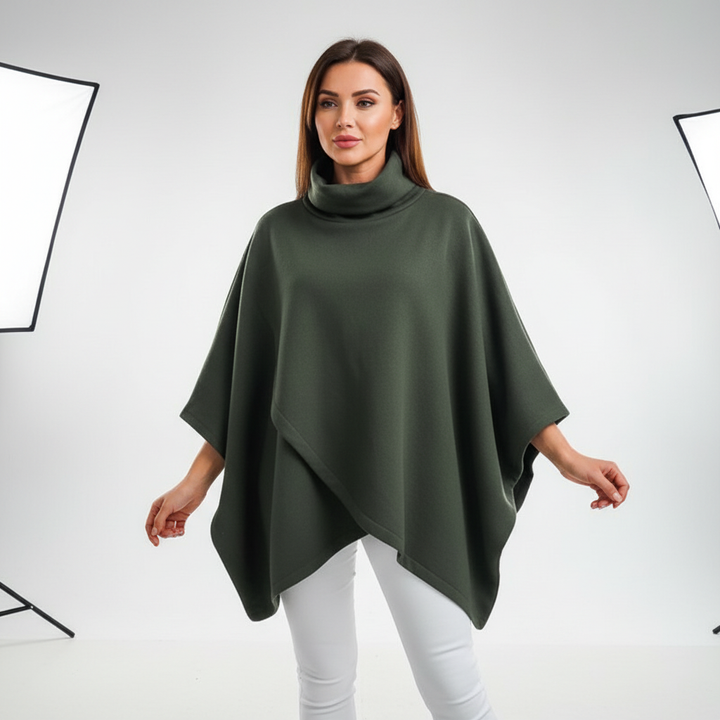 Model wearing a cozy women's oversized knit roll-neck sweater for winter fashion