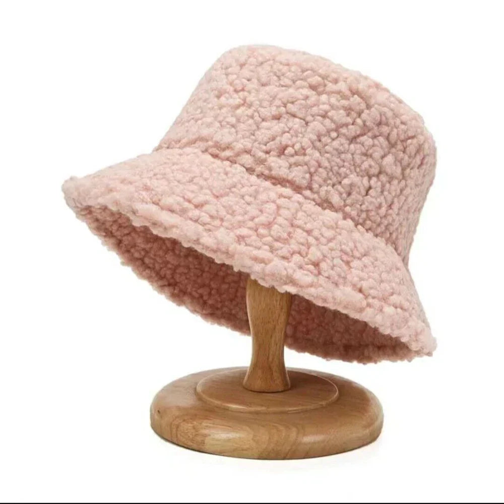 Soft cream-colored women's teddy bucket hat, an essential stylish winter hat