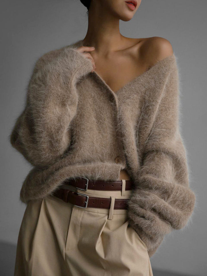 Elegant women's soft V-neck cardigan, a versatile and cozy layering piece for any stylish outfit.