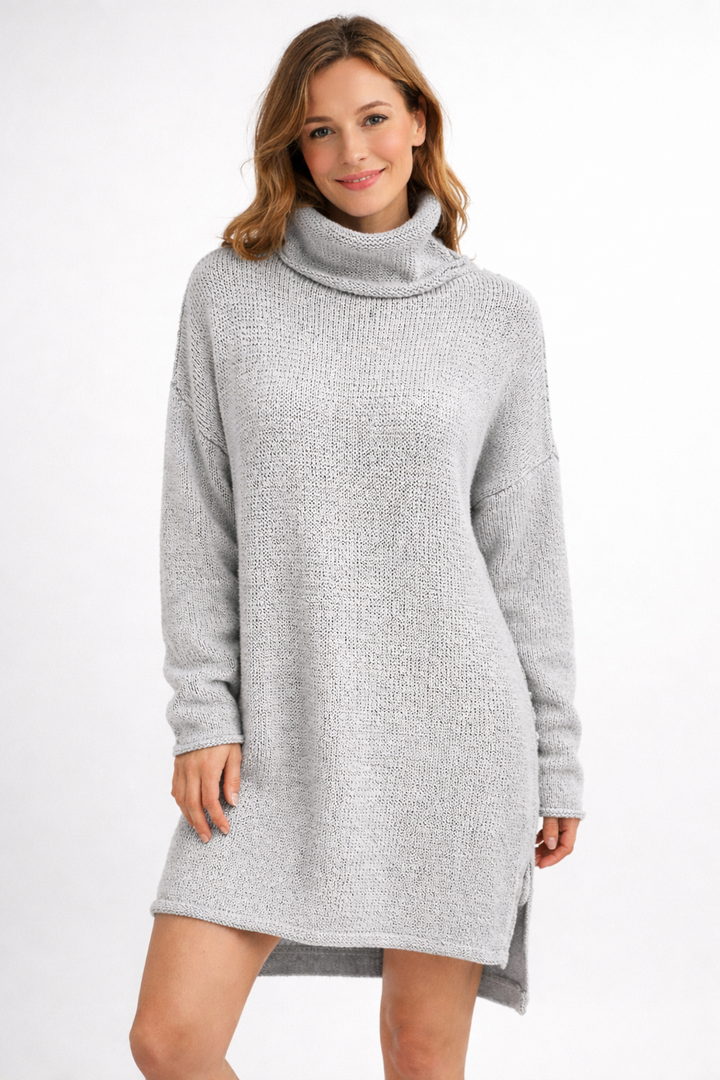Elegant women's longline turtleneck sweater, a cozy piece for chic autumn and winter fashion, relaxed fit.