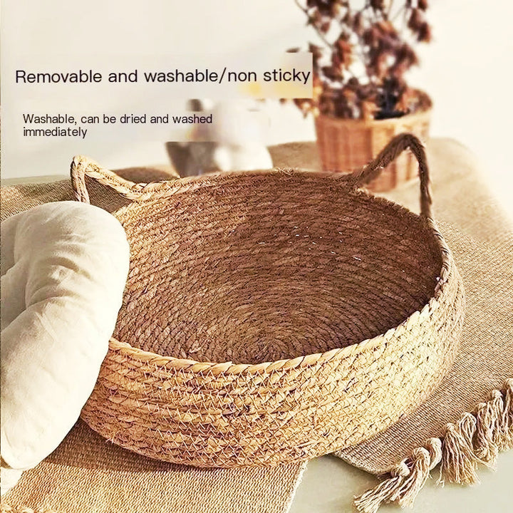 Comforting woven rattan cat bed. Durable, scratch-resistant & washable pet accessory for cats of all sizes.