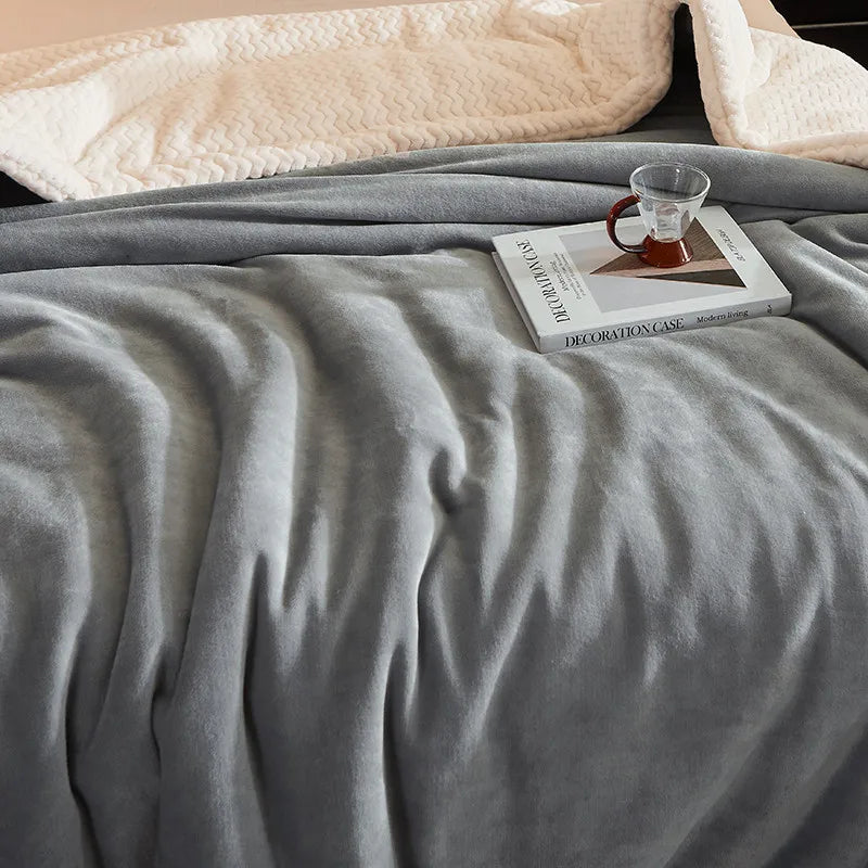 Plush CozyBlanket fleece blanket, providing exceptional warmth and a cozy feel