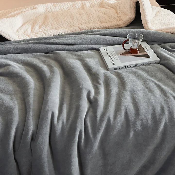 Plush CozyBlanket fleece blanket, providing exceptional warmth and a cozy feel