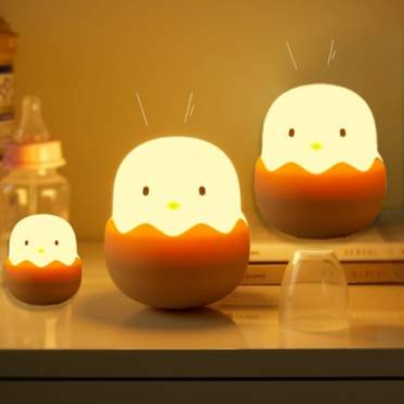 Cute chick night light casts a gentle glow, ideal for children's nursery decor, comforting bedtime, and gifts.