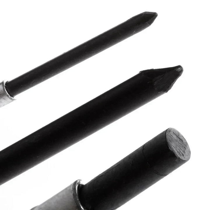 Hand holding a Craftix micro screwdriver from the 11-piece set, demonstrating use for precision tasks