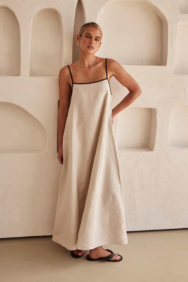 Women's comfortable cream oversized maxi dress, square neck, spaghetti straps. Perfect resort wear.