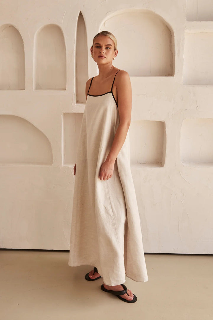 Summer fashion cream maxi dress, oversized & flowy, square neck, spaghetti strap detail.
