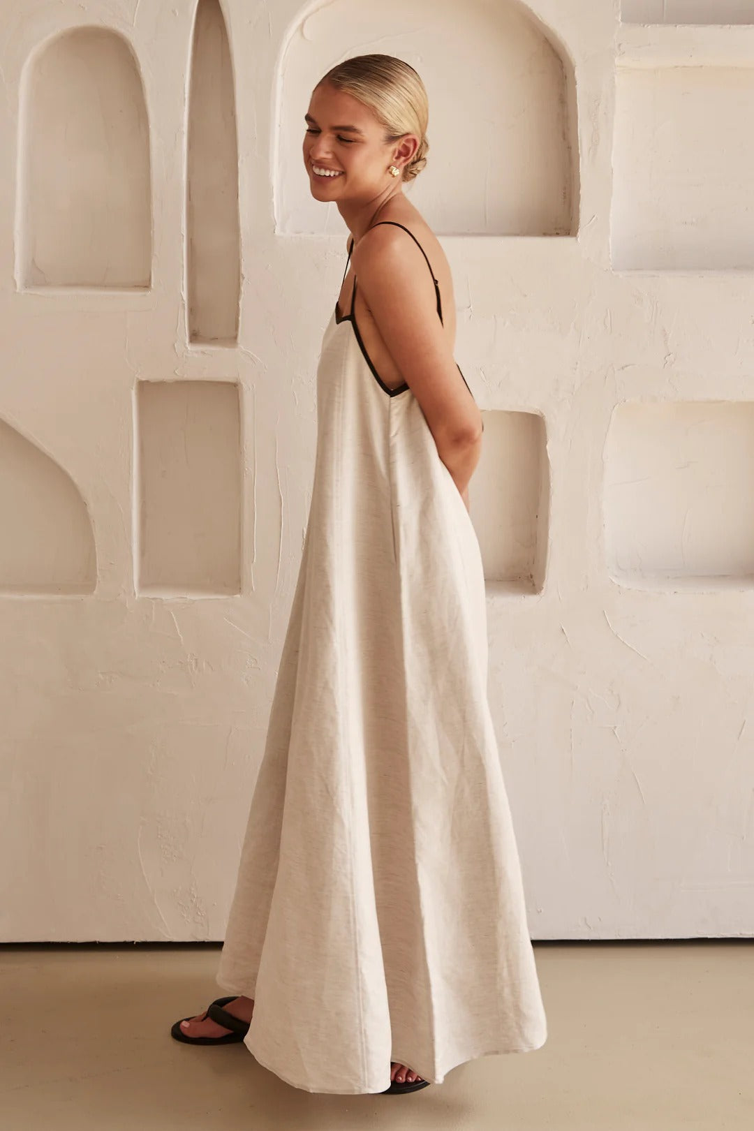 Women's cream oversized maxi dress, contrast trim, square neck, spaghetti strap for stylish comfort.