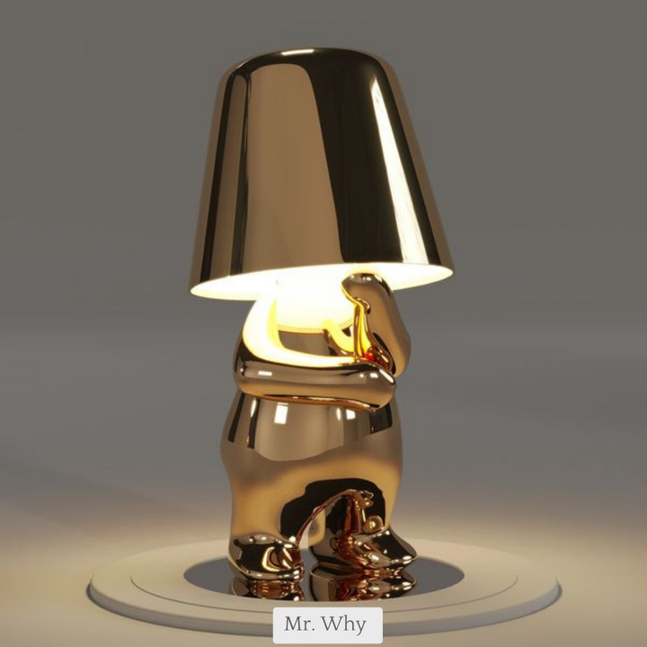 Sleek LED table lamp with unique thinker design. Ideal for home office decor.
