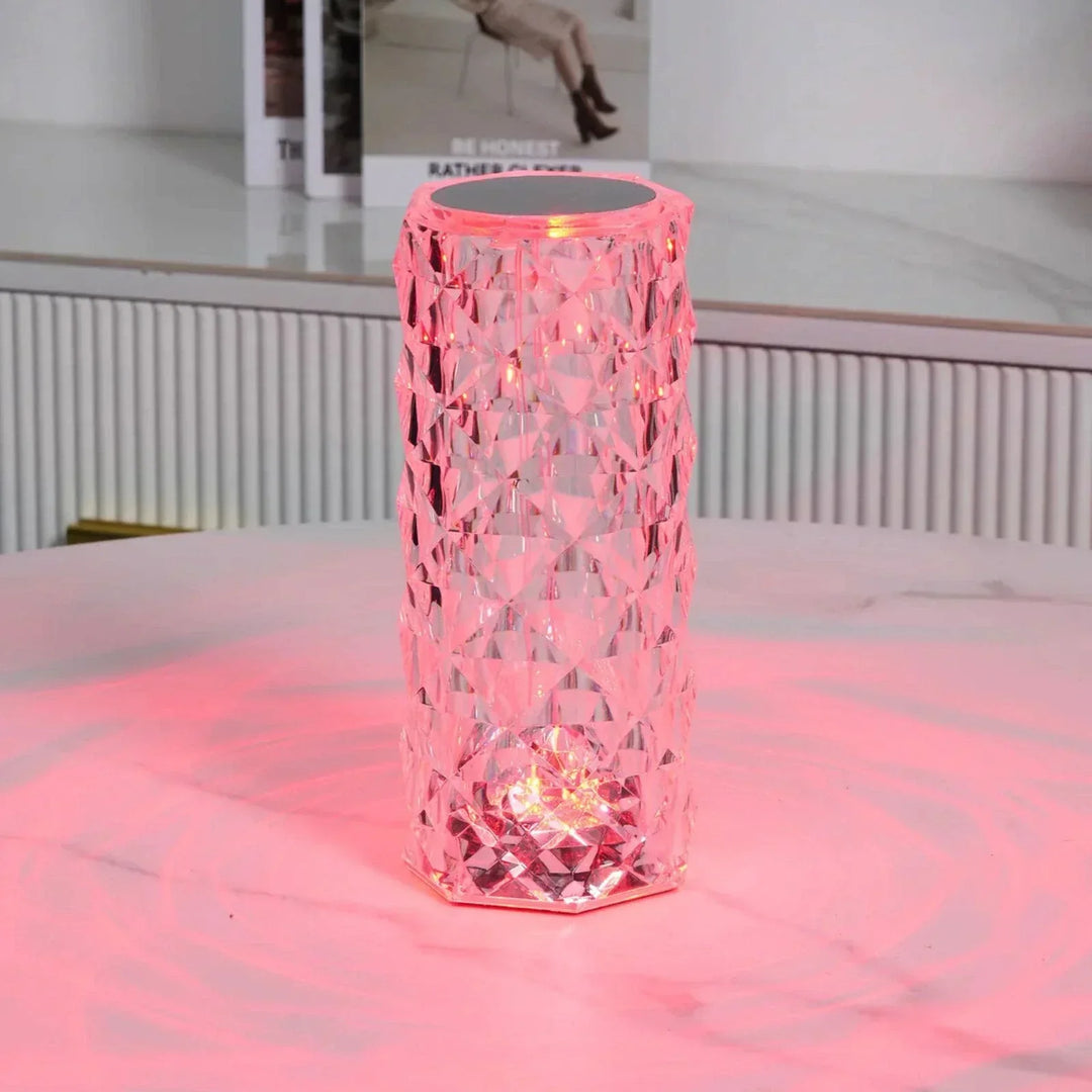 Bedroom scene with a glowing crystal touch lamp on a bedside table, offering relaxing ambient light