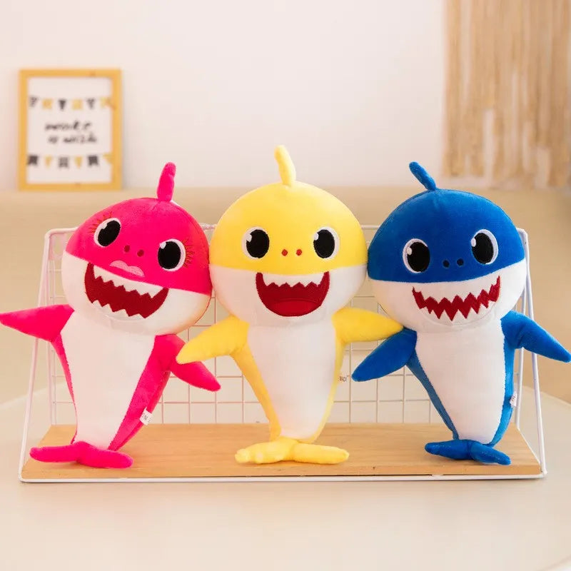Light-up musical shark plush toy for babies & kids. Soft, cuddly & sings, providing sensory play.