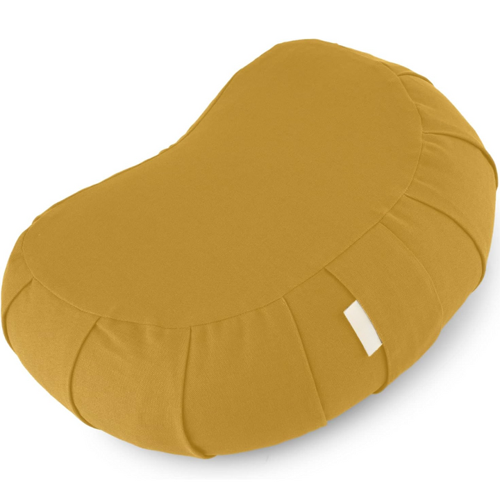 Mindful meditation cushion: curved organic cotton with buckwheat fill, designed for comfort & easy washing.