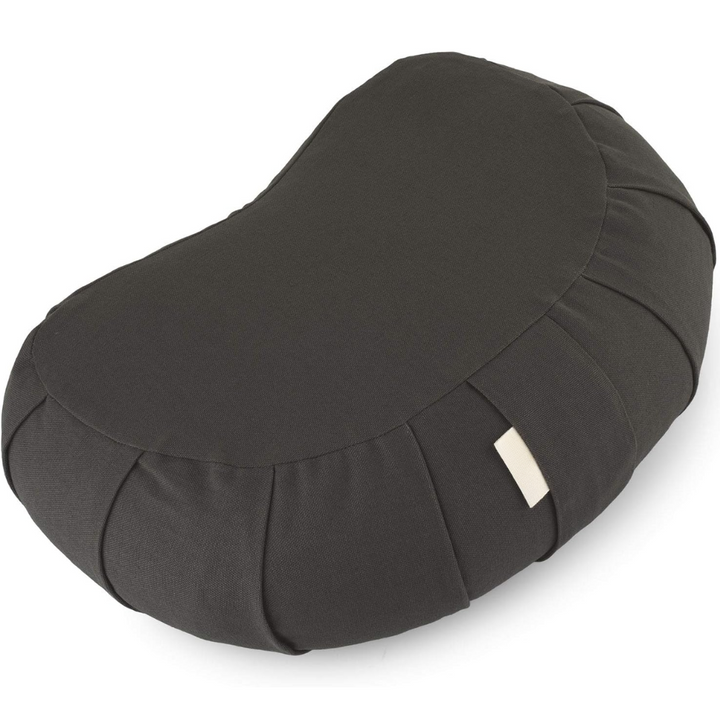 High-quality organic cotton yoga pillow with a curved shape, buckwheat fill, and convenient washable cover.