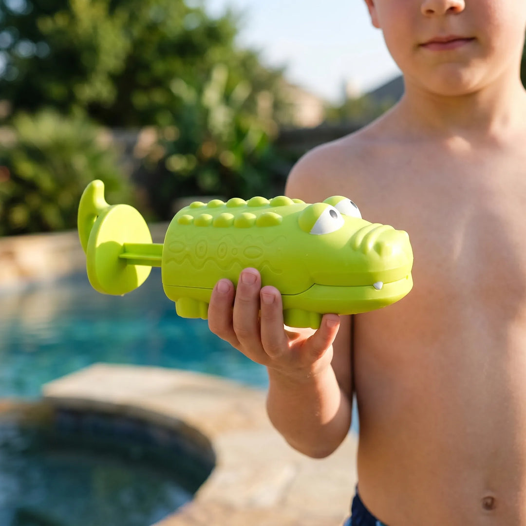 Fun dolphin animal water squirt toy for kids, perfect for summer pool, beach, and bath play.
