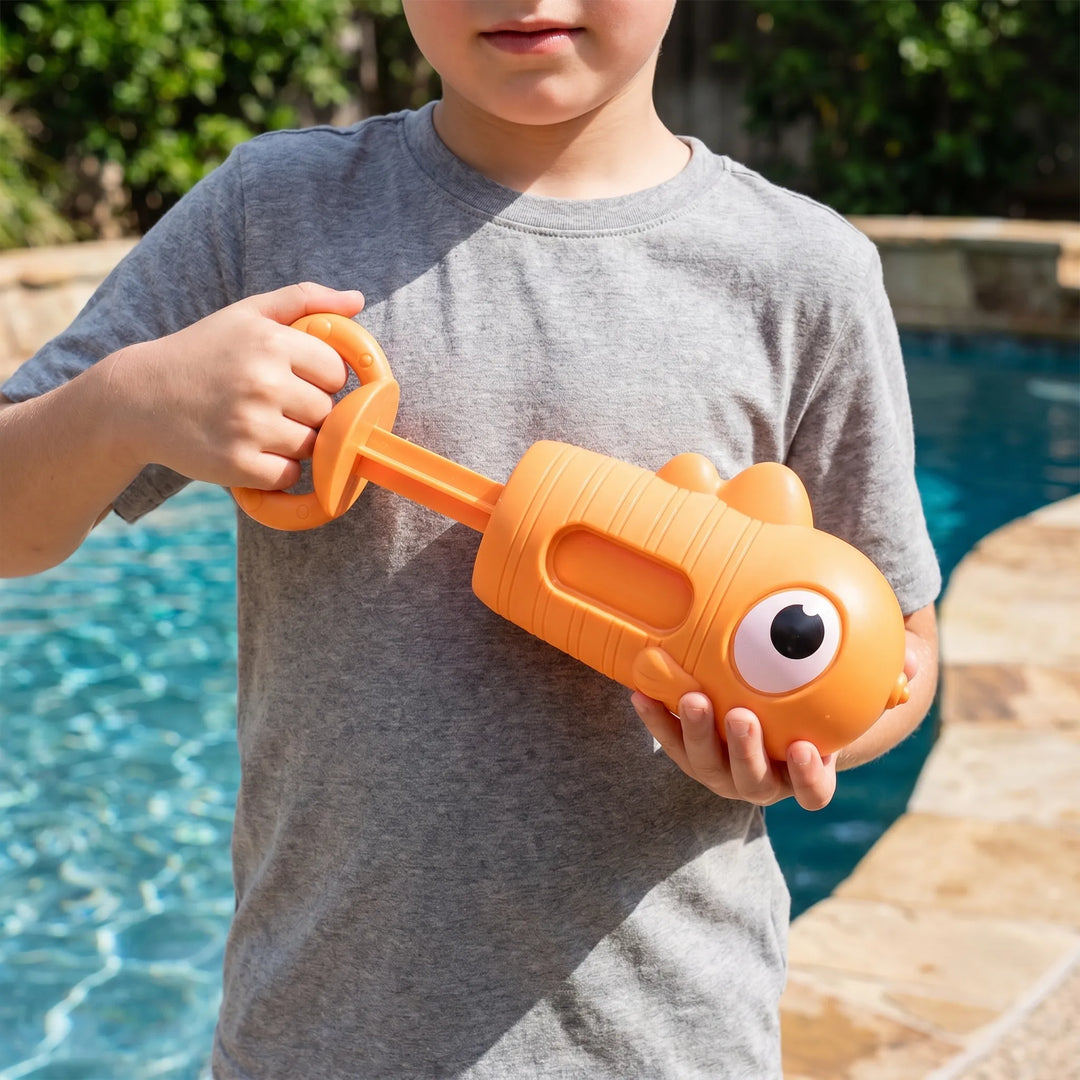 Yellow ducky animal water squirt toy for toddlers' bath, pool, or beach fun. Manual water blaster.